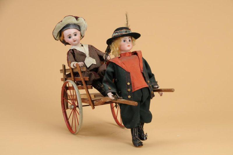 Appraisal: Boy Pulling Cart and Rider Automaton France ca a large