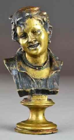 Appraisal: Spelter Bust Of FemaleTo depict a smiling possibly gypsy female