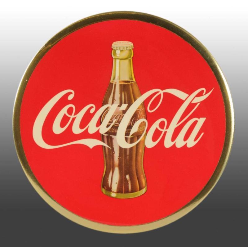 Appraisal: Celluloid Coca-Cola Disc Description s Includes original string holder and