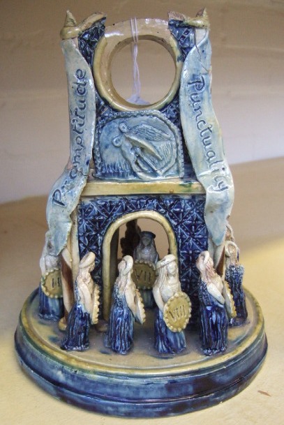 Appraisal: A Castle Hedingham pottery temple time watch stand circa a