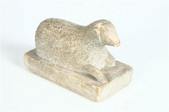 Appraisal: CARVED LAMB American th century marble Charming recumbent lamb on