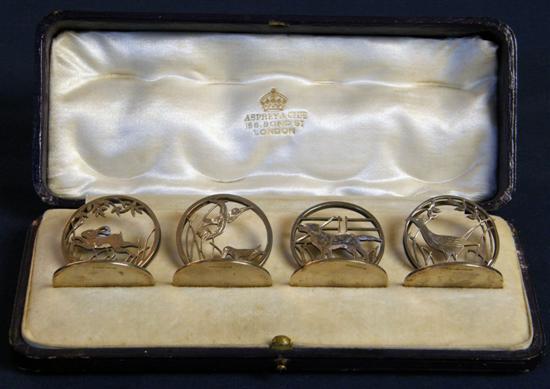 Appraisal: Set of four George V silver menu holders with pierced