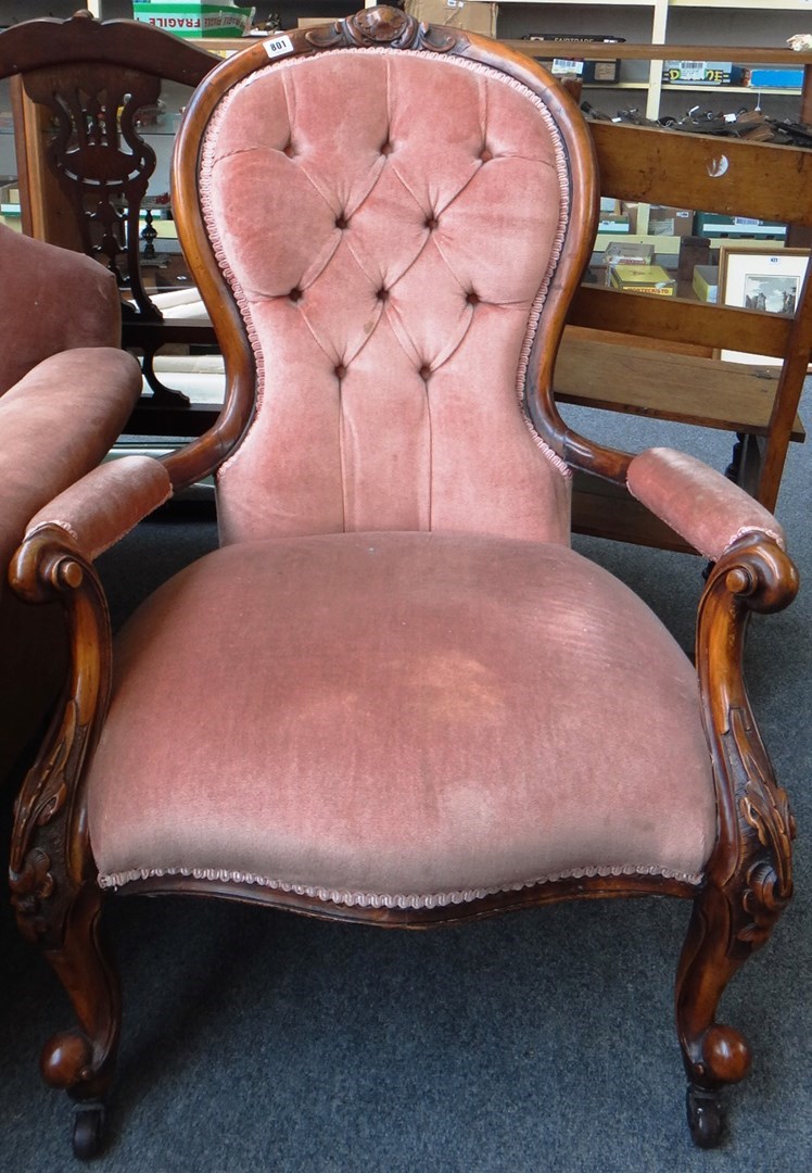 Appraisal: A Victorian walnut framed semi-padded open arm chair with serpentine