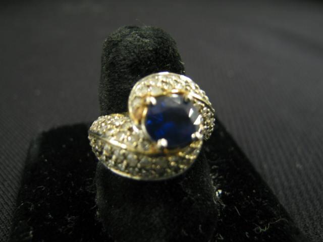 Appraisal: Sapphire Diamond Ring deep blue carat oval gem surrounded by