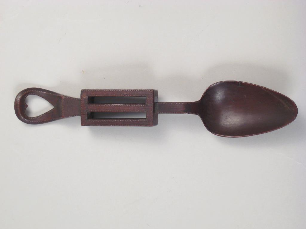 Appraisal: A th Century Welsh Treen Love Spoon with pierced heart