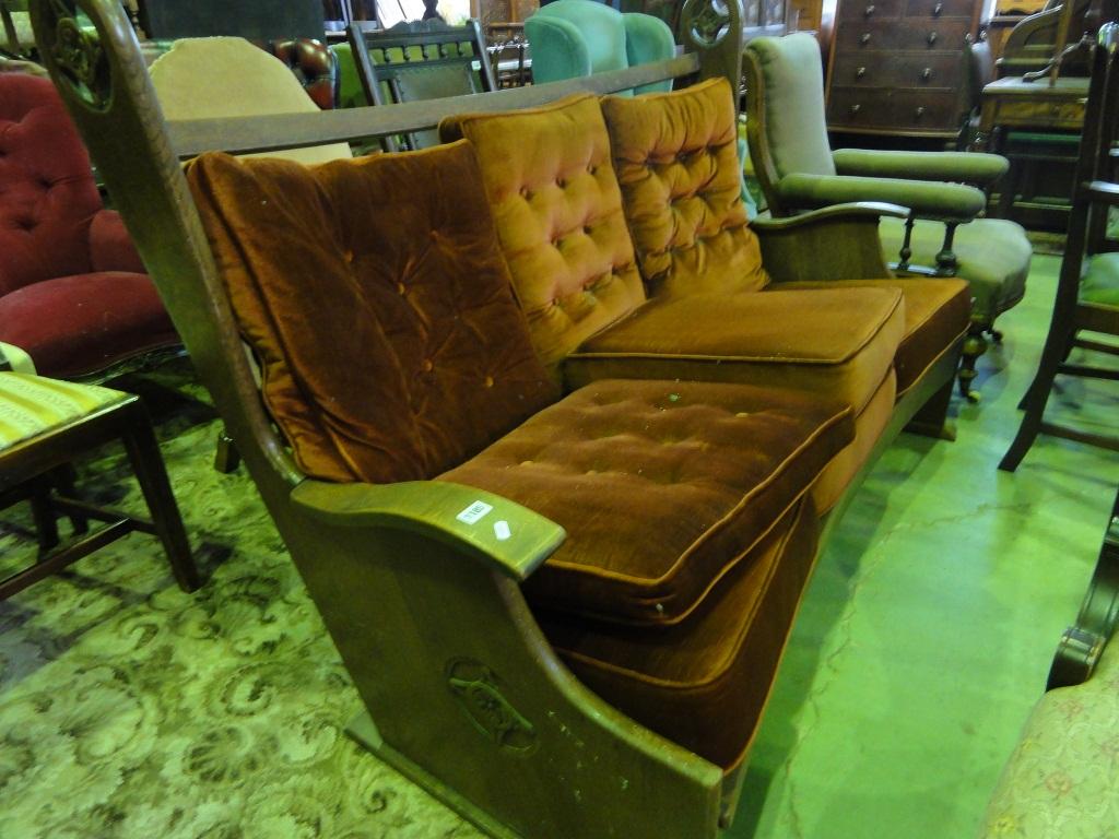 Appraisal: An oak framed three seat sofa probably Dutch with bowed