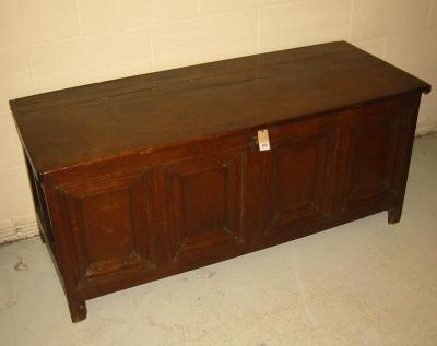 Appraisal: AN OAK PANELLED COFFER early th century with hinged plank