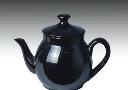 Appraisal: BLACK-GLAZED REDWARE TEAPOT AND COVER POSSIBLY MASSACHUSETTS EARLY NINETEENTH CENTURY