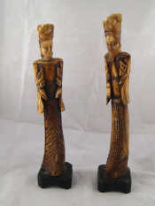 Appraisal: A pair of horn carvings of a man and woman