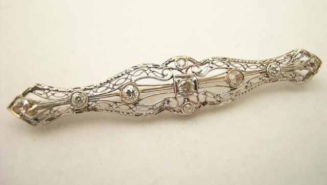 Appraisal: k yellow and white gold vintage filigree diamond bar pin