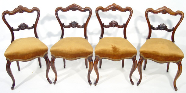 Appraisal: Set of four Victorian rosewood dining chairs with serpentine fronted