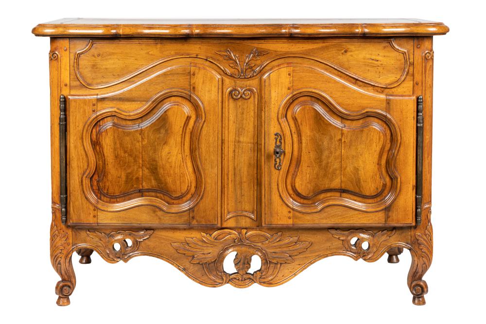 Appraisal: LOUIS XV PROVINCIAL WALNUT BUFFETthe top with wavy molding along