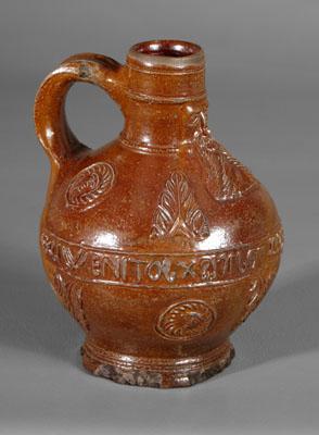 Appraisal: Fine early German Bellarmine jug brown-glazed stoneware with mask leaf