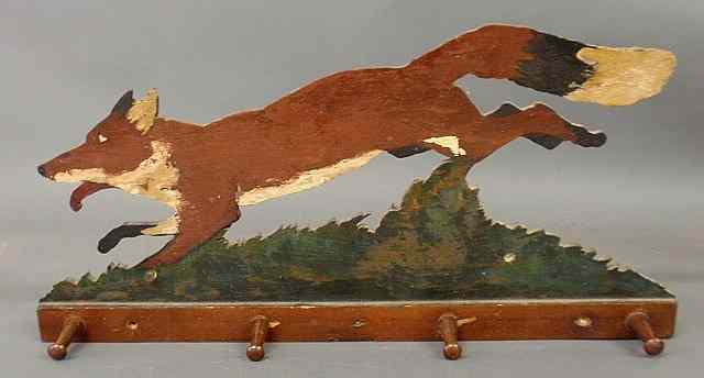 Appraisal: Jig sawed and paint decorated running fox coat rack with