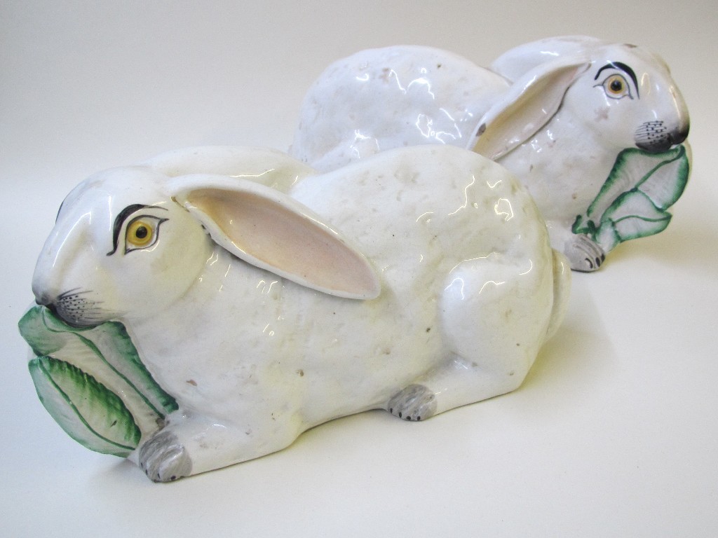 Appraisal: A pair of Staffordshire rabbits each seated and eating lettuce