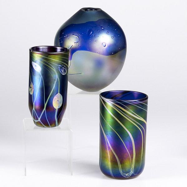 Appraisal: NICK DELMATTO Two iridescent cylinder shaped vases with pulled decoration