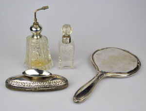 Appraisal: A silver-topped atomiser and another scent bottles t w a