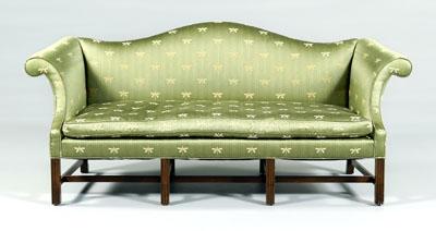 Appraisal: Chippendale style mahogany sofa arched back and rolled arms stop-fluted