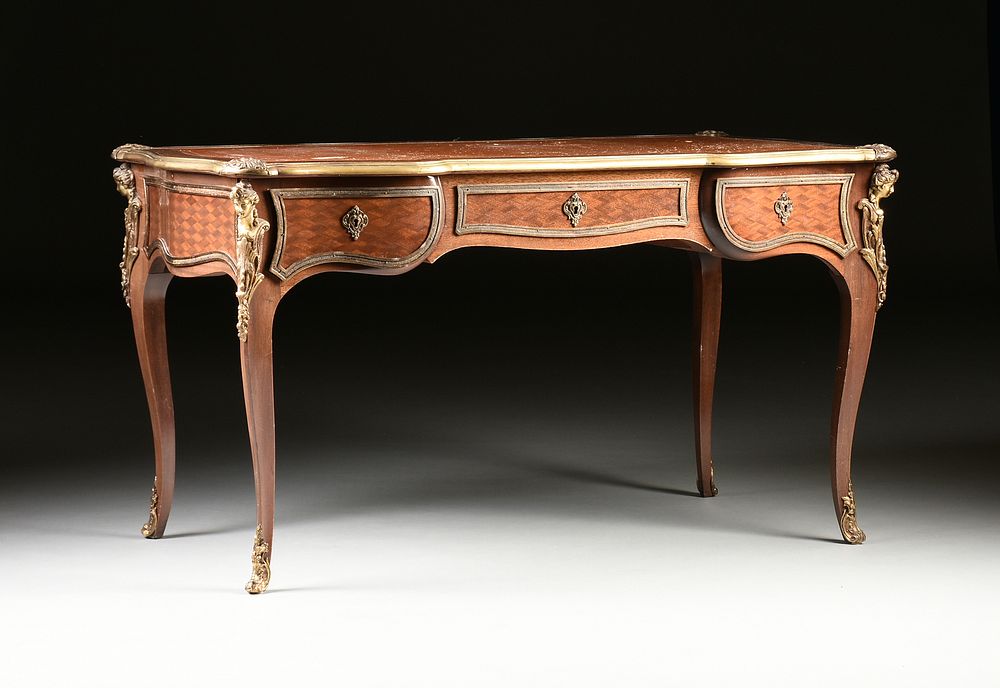 Appraisal: A LOUIS XV STYLE ORMOLU MOUNTED TULIPWOOD PARQUETRY BUREAU PLAT