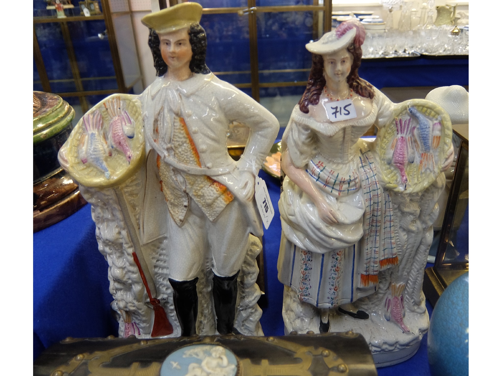 Appraisal: Pair of large Staffordshire figures of a hunter and huntress