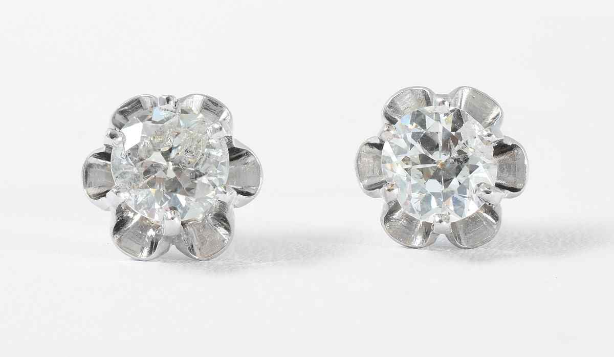 Appraisal: CT DIAMOND BUTTERCUP STUD EARRINGS k white gold diamond stud