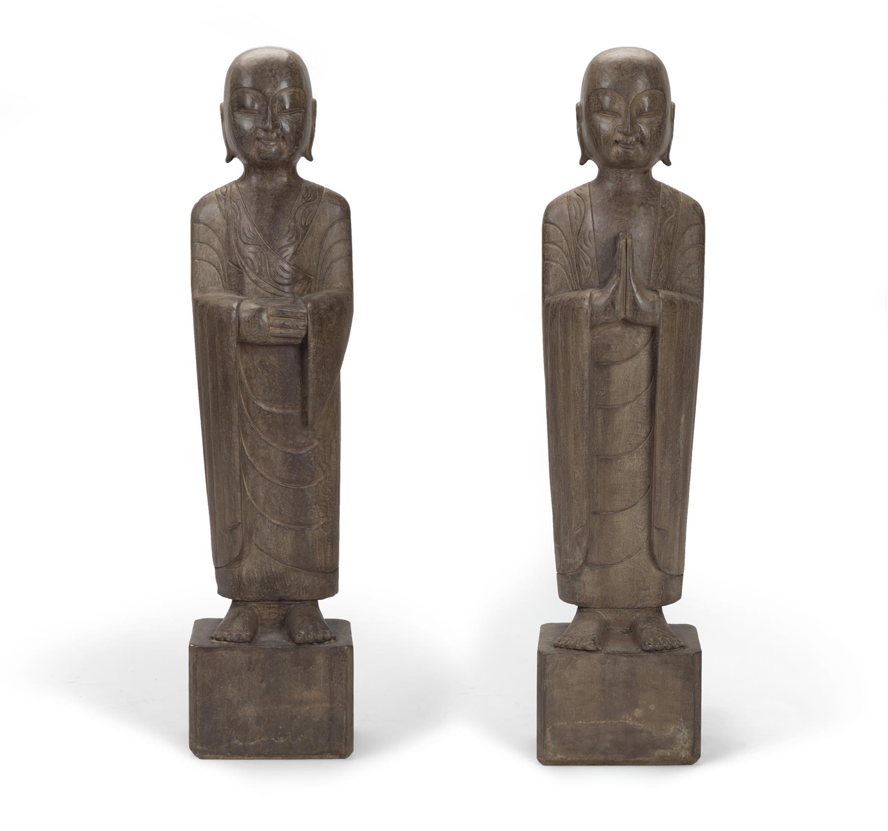 Appraisal: PAIR OF CHINESE STONE CARVED LOHAN FIGURES Twentieth century Robed