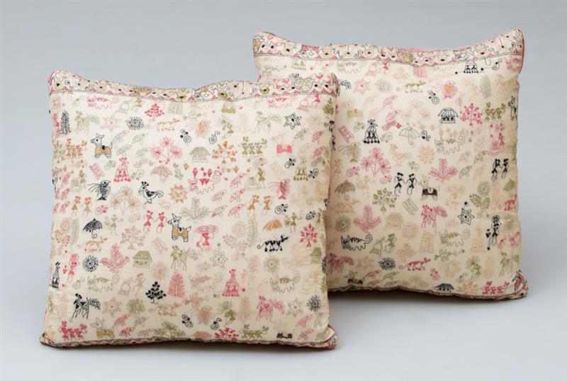 Appraisal: PAIR OF EMBROIDERED PILLOWS Rose velvet on reverse x in