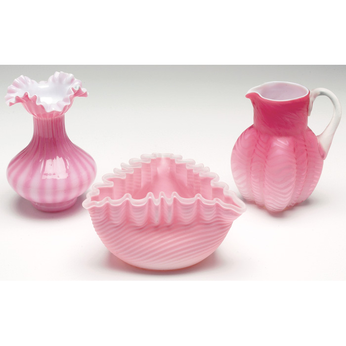 Appraisal: Art Glass vase waisted form with ruffled rim in pink