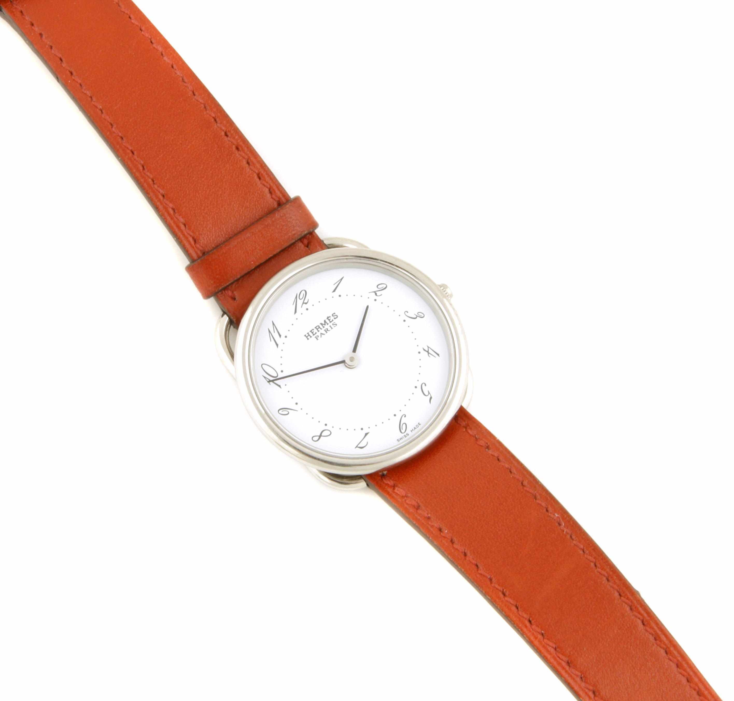 Appraisal: A stainless steel and red leather strapped wristwatch Hermes Espace