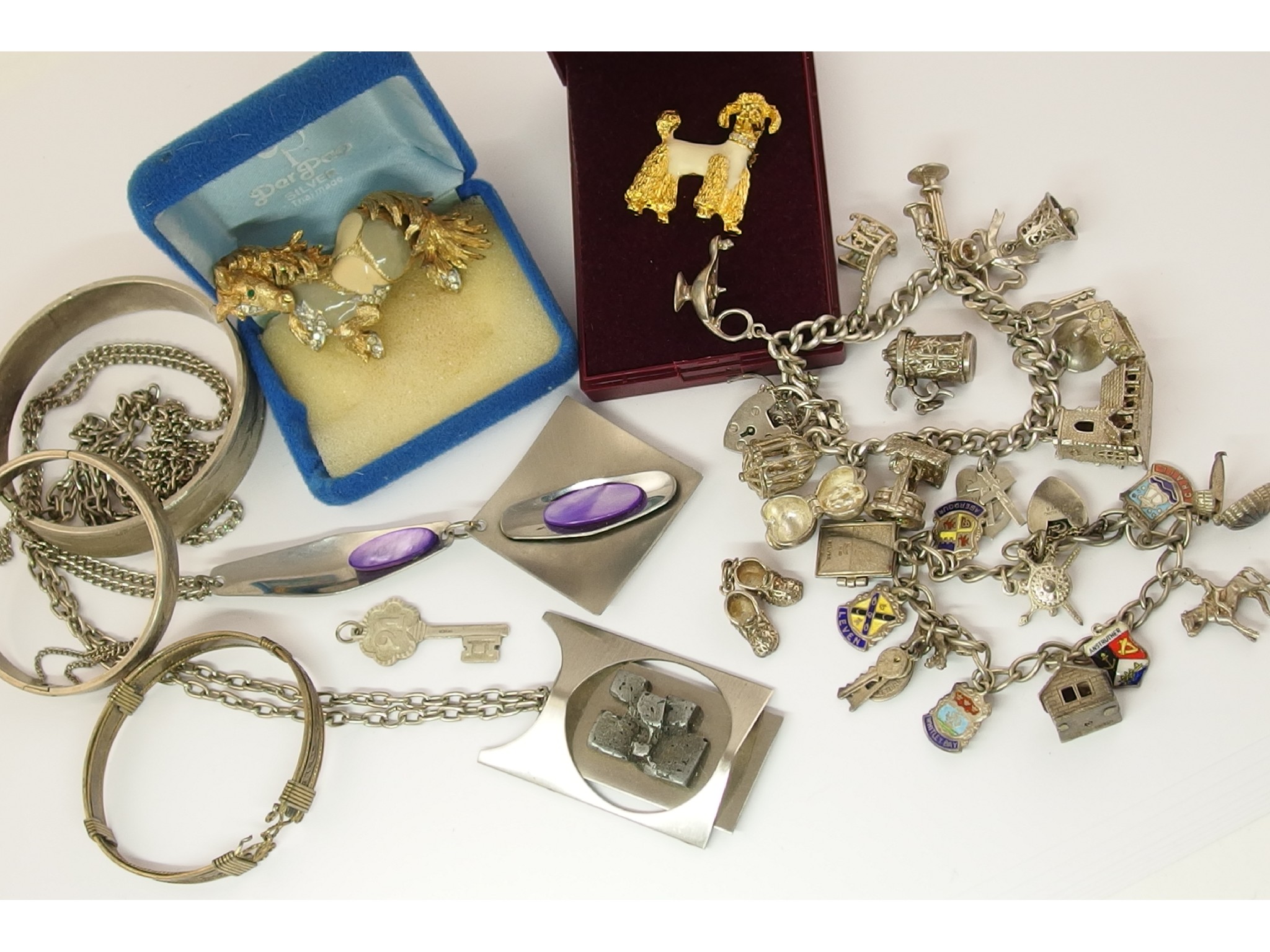 Appraisal: Two silver charm bracelets and a collection of costume jewellery