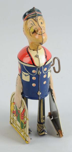 Appraisal: Marx Tin Litho Wind-Up Walking Popeye Toy Has original pipe