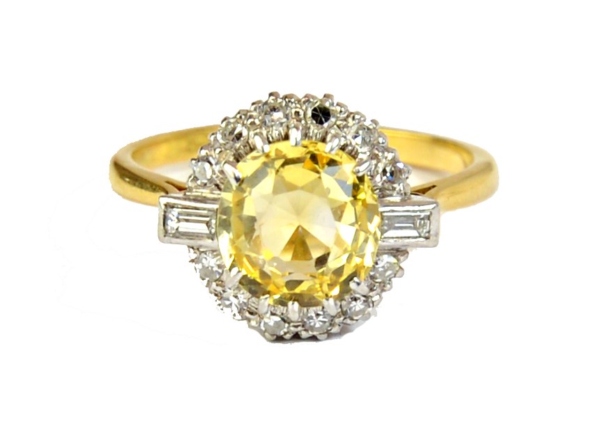 Appraisal: A gold and platinum yellow sapphire and diamond set cluster