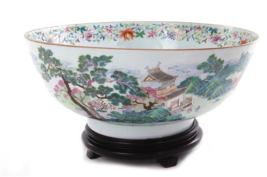 Appraisal: Chinese famille rose punch bowl Qing dynasty decorated with extensive