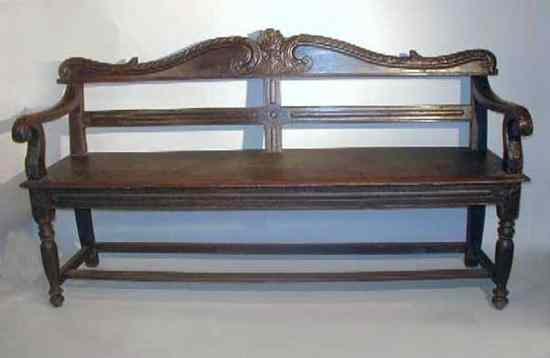 Appraisal: An Anglo Indian Teak Bench circa having a scrolled crest