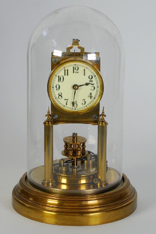 Appraisal: EARLY TWENTIETH CENTURY BRASS ANNIVERSARY CLOCK by Gustav Becker typical