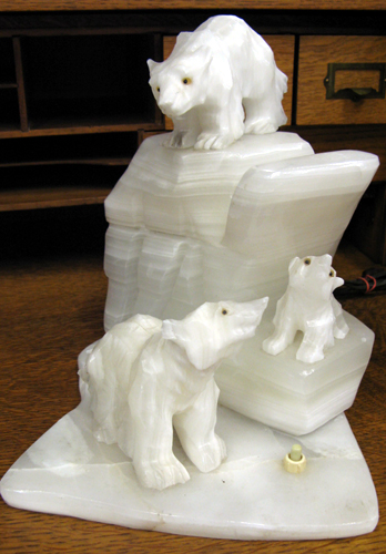 Appraisal: A WHITE ONYX FIGURAL TABLE TOP LAMP hand carved and