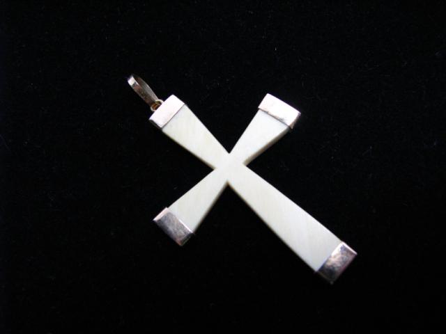 Appraisal: Ivory cross pendant with K yellow gold tips and clasp