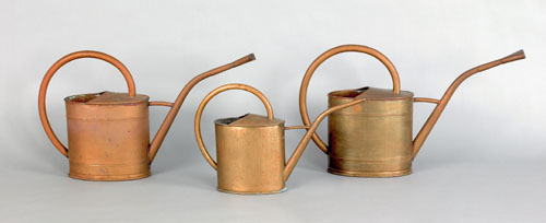 Appraisal: Three brass watering cans early th c