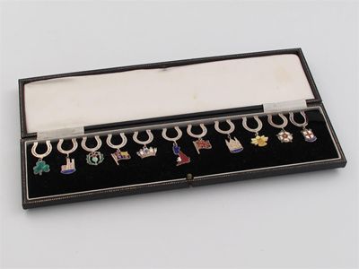 Appraisal: A set of eleven silver and enamel commemorative clips maker's