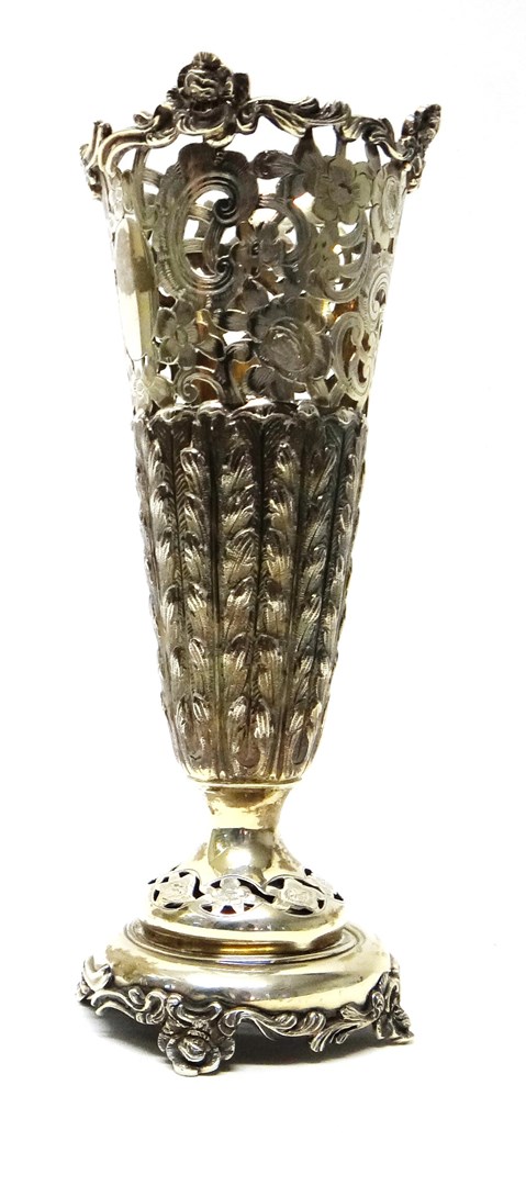 Appraisal: A silver spill vase frame with embossed pierced and engraved