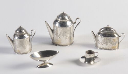 Appraisal: A collection of miniature silver including a three piece tea