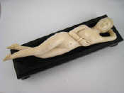 Appraisal: A th c Chinese ivory doctor's naked recumbent model length