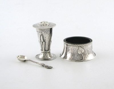 Appraisal: An Arts and Crafts silver salt cellar and pepper pot