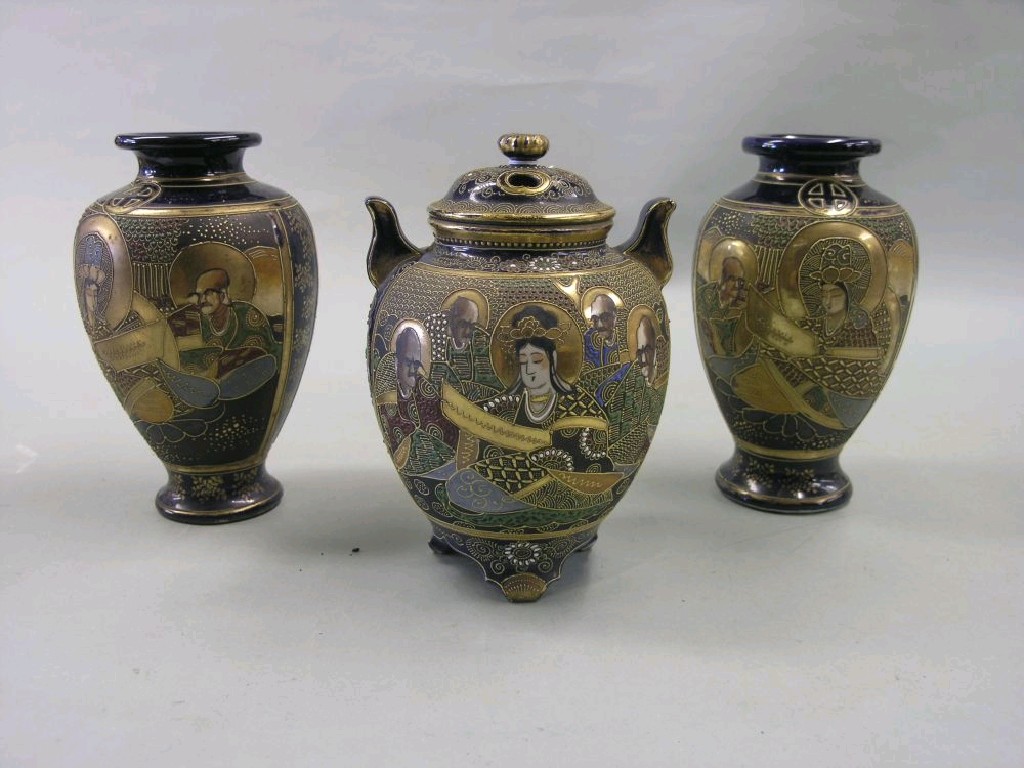 Appraisal: A pair of Satsuma vases ovoid shape brocaded with portrait