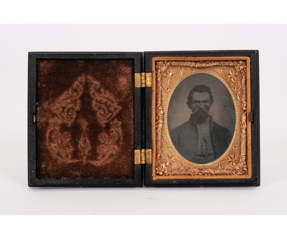 Appraisal: Tintype of a Confederate soldier mounted in a velvet gutta