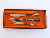 Appraisal: A modern Italian three-piece thread-edged silver-handled cheese set Vicenza post