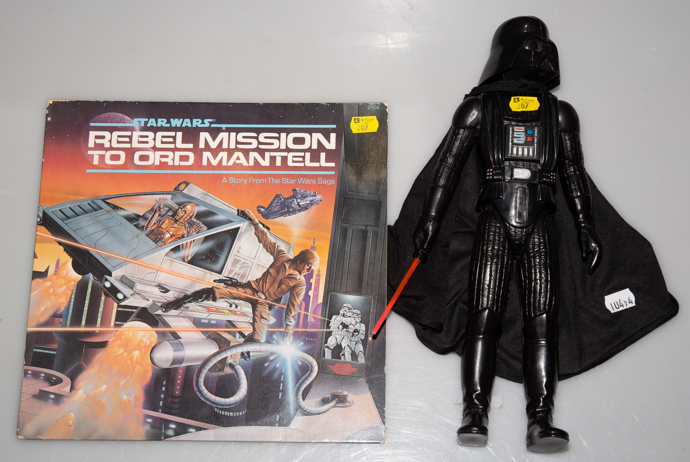 Appraisal: KENNER DARTH VADER FIGURE With lightsaber and cloth cape also