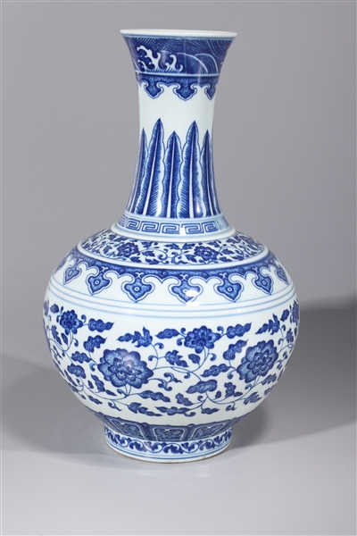 Appraisal: Chinese Qianlong style blue and white porcelain vase with floral