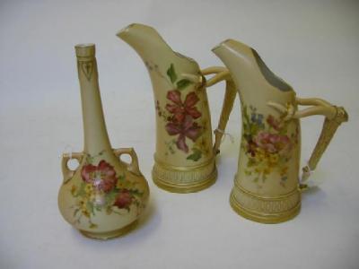 Appraisal: TWO ROYAL WORCESTER BLUSH IVORY TUSK HANDLED JUGS dated and