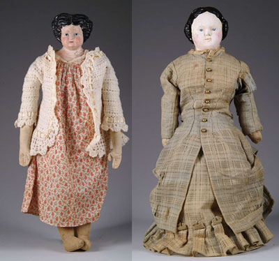 Appraisal: PAIR OF LARGER PAPIER-M CH DOLLS and respectively The first